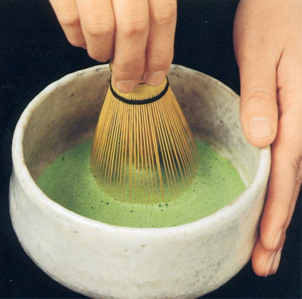 Preparing Mtacha Ceremonial. Using a matcha whisk set. Chasen is the Japanese name for bamboo Matcha whisk.